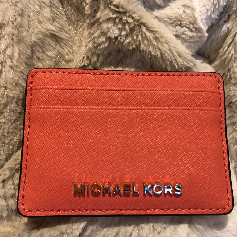 Authentic Michael Kors pink grapefruit card holder